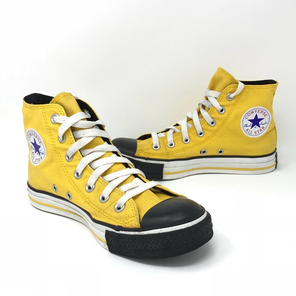 black and yellow converse shoes